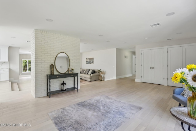 8 Olden Ct, Colts Neck, NJ 07722 - living area featuring light wood finished floors and baseboards