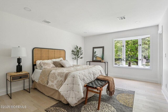 8 Olden Ct, Colts Neck, NJ 07722 - bedroom with light wood-style floors