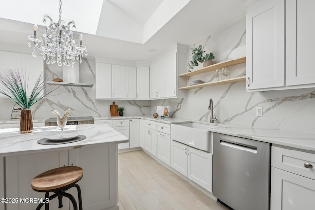 8 Olden Ct, Colts Neck, NJ 07722 - kitchen with dishwasher, tasteful backsplash, open shelves, white cabinetry, and light stone counters