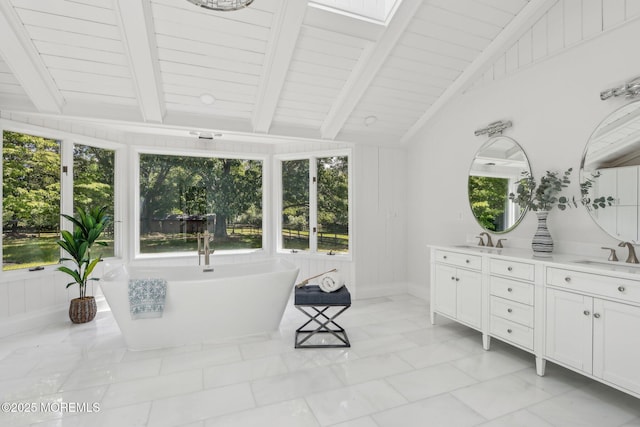8 Olden Ct, Colts Neck, NJ 07722 - full bath with double vanity, a freestanding bath, healthy amount of natural light, marble look tiles, and wooden ceiling