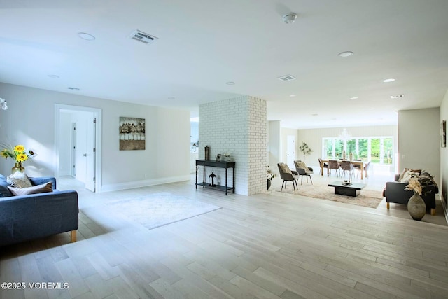 8 Olden Ct, Colts Neck, NJ 07722 - living area with wood finished floors, recessed lighting, and a fireplace