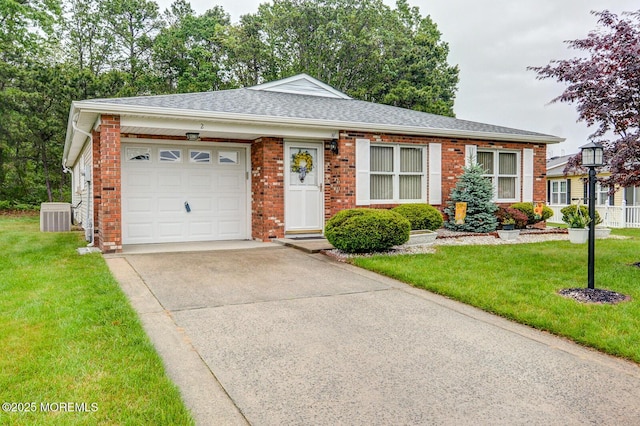 2 Thames Pl, Brick, NJ 08723 - view of front facade featuring central air condition unit, driveway, an attached garage, a shingled roof, and a front yard