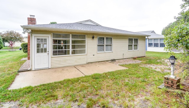 2 Thames Pl, Brick, NJ 08723 - back of property with a chimney, a yard, a patio, and roof with shingles