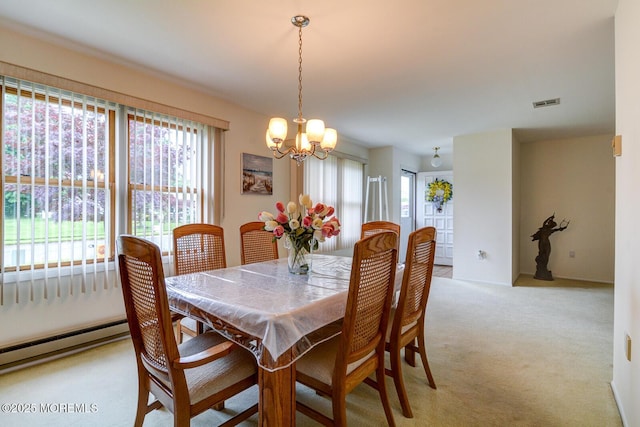 2 Thames Pl, Brick, NJ 08723 - dining area featuring a baseboard heating unit, a chandelier, and light colored carpet