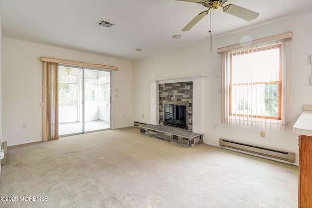 2 Thames Pl, Brick, NJ 08723 - unfurnished living room featuring a baseboard radiator, a ceiling fan, a stone fireplace, and carpet flooring