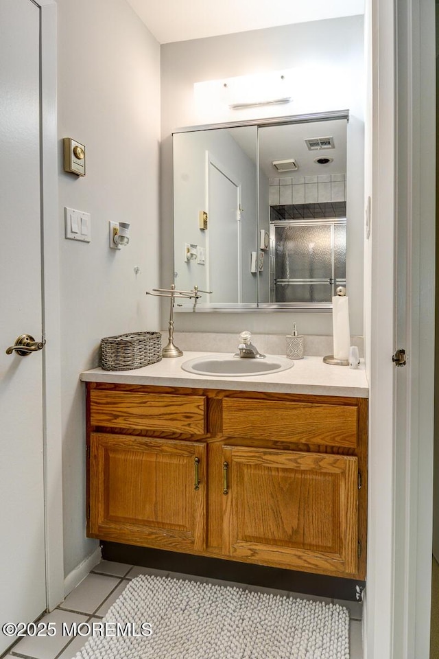 2 Thames Pl, Brick, NJ 08723 - bathroom with vanity, tile patterned flooring, and an enclosed shower
