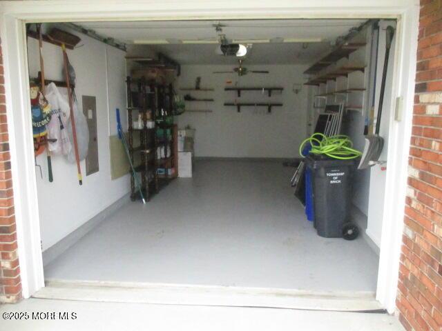 2 Thames Pl, Brick, NJ 08723 - garage with a garage door opener and a ceiling fan