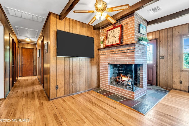 162 Delaware Ave, Atlantic Highlands, NJ 07716 - unfurnished living room with attic access, hardwood / wood-style flooring, beam ceiling, ceiling fan, and wood walls