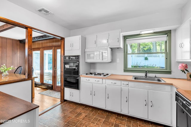 162 Delaware Ave, Atlantic Highlands, NJ 07716 - kitchen featuring black appliances, a sink, a warming drawer, and plenty of natural light