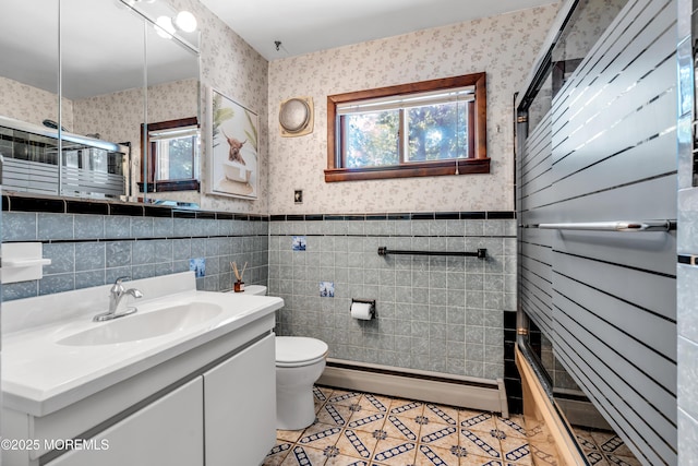 162 Delaware Ave, Atlantic Highlands, NJ 07716 - bathroom featuring baseboard heating, wallpapered walls, vanity, tile patterned floors, and a shower with shower door