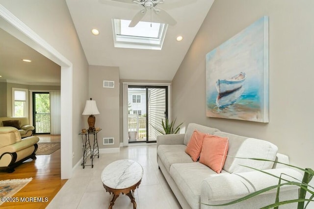 580 Patten Ave # 53, Long Branch, NJ 07740 - tiled living room with healthy amount of natural light, a skylight, ceiling fan, recessed lighting, and baseboards