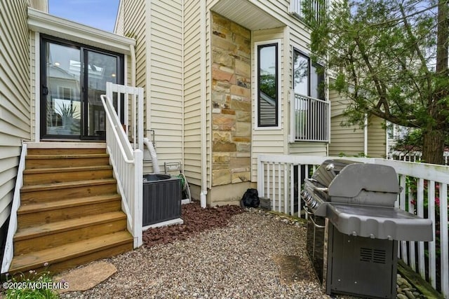 580 Patten Ave # 53, Long Branch, NJ 07740 - view of property exterior with stone siding and cooling unit