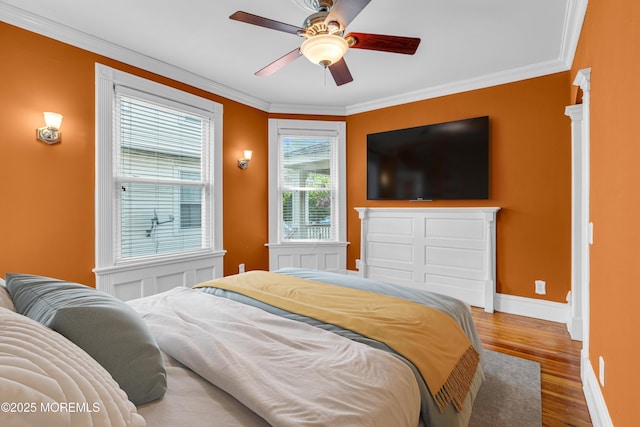 511 4th Ave, Asbury Park, NJ 07712 - bedroom featuring crown molding, wood finished floors, baseboards, and ceiling fan