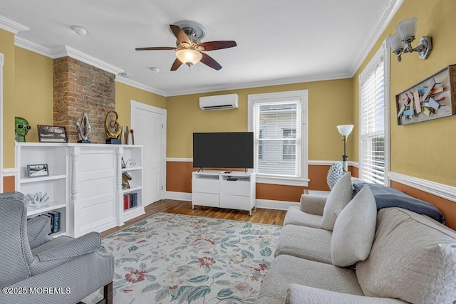 511 4th Ave, Asbury Park, NJ 07712 - living area featuring an AC wall unit, ceiling fan, wood finished floors, ornamental molding, and baseboards