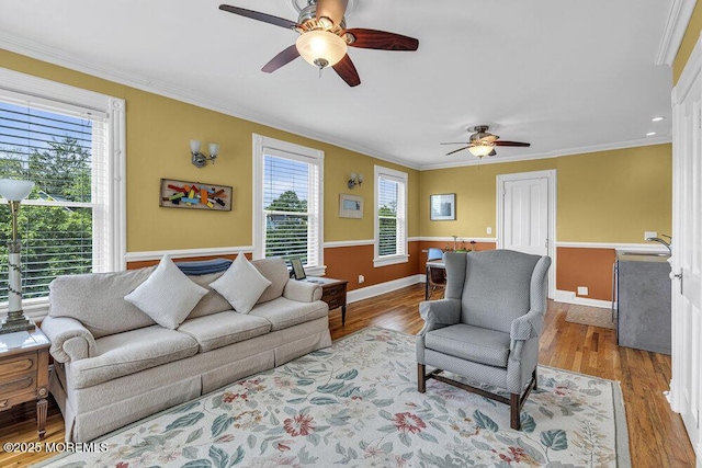 511 4th Ave, Asbury Park, NJ 07712 - living area featuring a ceiling fan, ornamental molding, wood finished floors, and baseboards