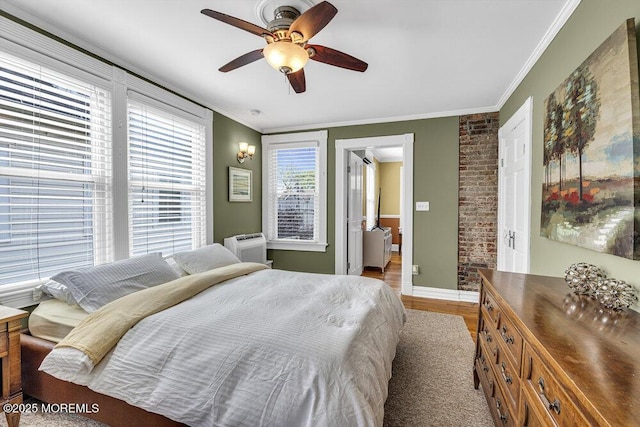 511 4th Ave, Asbury Park, NJ 07712 - bedroom featuring ornamental molding, light wood-style flooring, baseboards, and a ceiling fan
