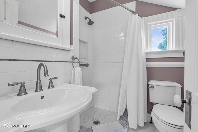 511 4th Ave, Asbury Park, NJ 07712 - bathroom featuring a sink, toilet, and a tile shower