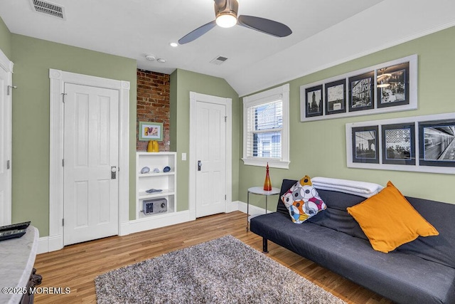 511 4th Ave, Asbury Park, NJ 07712 - sitting room featuring ceiling fan, wood finished floors, baseboards, and vaulted ceiling