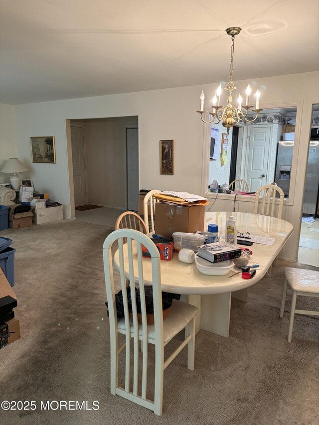 145A Concordia Cir, Monroe, NJ 08831 - carpeted dining space featuring a chandelier