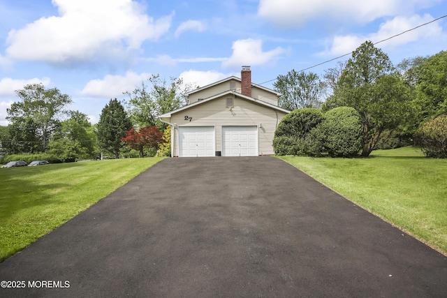 27 Sargent Rd, Freehold, NJ 07728 - view of home's exterior featuring a chimney, asphalt driveway, a yard, and an attached garage