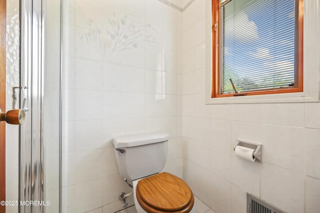 27 Sargent Rd, Freehold, NJ 07728 - bathroom featuring toilet and a shower with shower door
