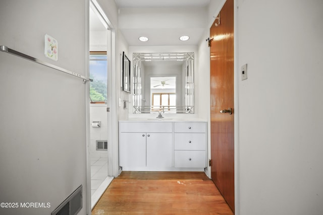 27 Sargent Rd, Freehold, NJ 07728 - bathroom with vanity and wood finished floors