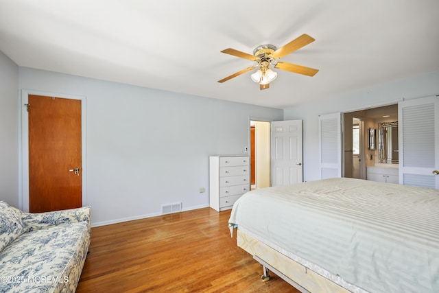 27 Sargent Rd, Freehold, NJ 07728 - bedroom featuring baseboards, wood finished floors, a ceiling fan, and ensuite bathroom