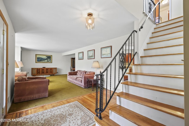 27 Sargent Rd, Freehold, NJ 07728 - living area with stairs and wood finished floors