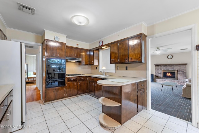 24 Heidl Ave, West Long Branch, NJ 07764 - kitchen with oven, freestanding refrigerator, a warming drawer, a ceiling fan, and light countertops