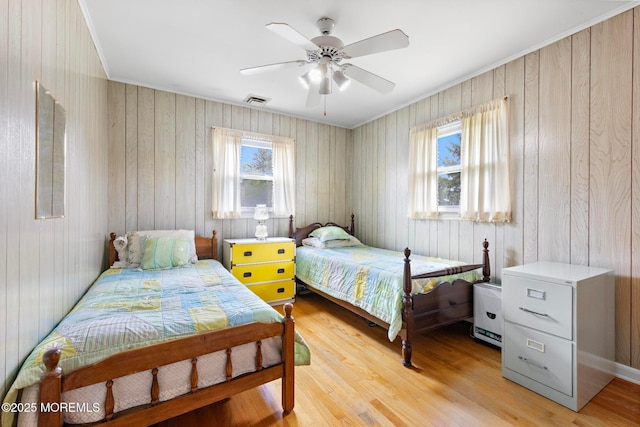 24 Heidl Ave, West Long Branch, NJ 07764 - bedroom with light wood-style floors, a ceiling fan, and ornamental molding