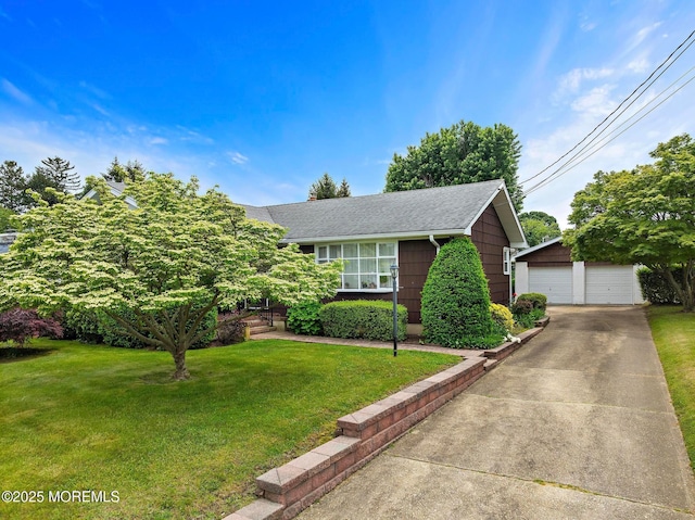 24 Heidl Ave, West Long Branch, NJ 07764 - view of front facade featuring a detached garage, an outbuilding, a front lawn, and roof with shingles