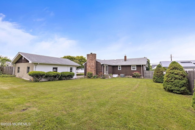24 Heidl Ave, West Long Branch, NJ 07764 - back of house featuring a chimney