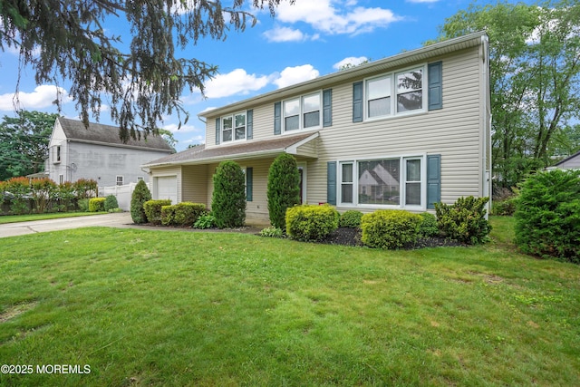 70 Walnut Ave, Red Bank, NJ 07701 - traditional-style house with an attached garage, concrete driveway, and a front yard