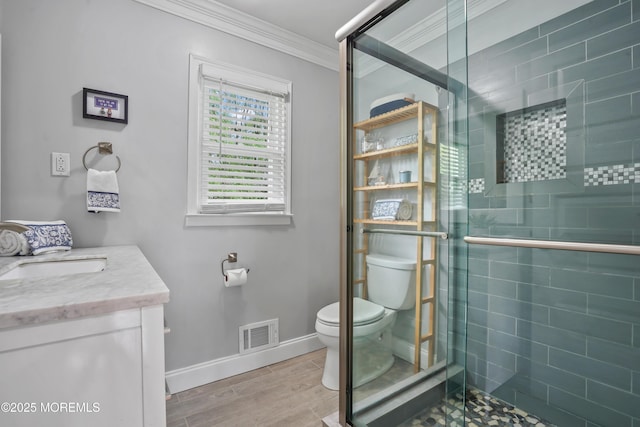 70 Walnut Ave, Red Bank, NJ 07701 - full bathroom with toilet, vanity, a stall shower, ornamental molding, and baseboards