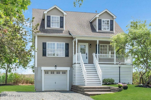 27 Main St, Port Monmouth, NJ 07758 - view of front facade featuring an attached garage, a porch, gravel driveway, stairway, and a shingled roof