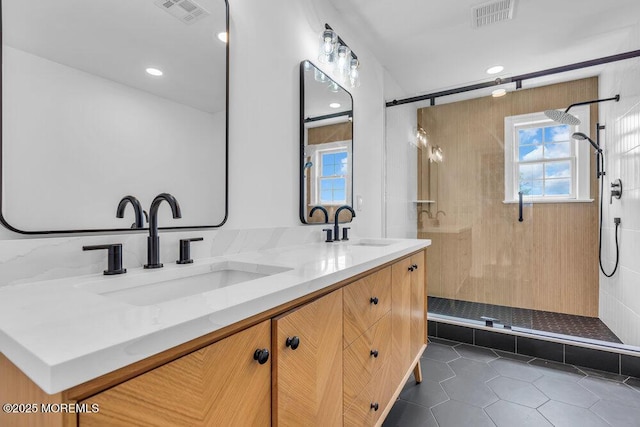 27 Main St, Port Monmouth, NJ 07758 - full bathroom with tile patterned floors, a stall shower, double vanity, and recessed lighting