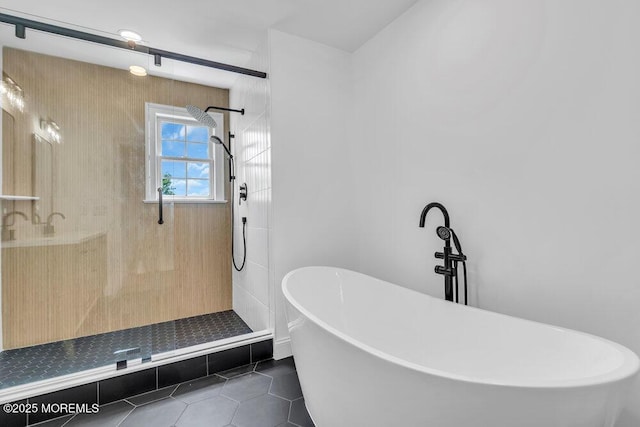 27 Main St, Port Monmouth, NJ 07758 - full bathroom with a tile shower, a freestanding bath, and tile patterned flooring