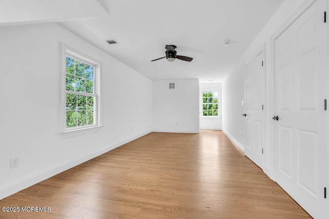27 Main St, Port Monmouth, NJ 07758 - unfurnished room featuring light wood-style floors, a ceiling fan, and baseboards