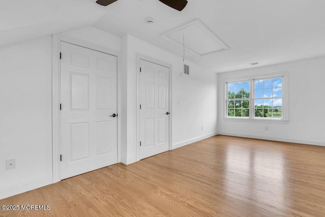 27 Main St, Port Monmouth, NJ 07758 - unfurnished bedroom featuring attic access, light wood-style flooring, ceiling fan, and baseboards