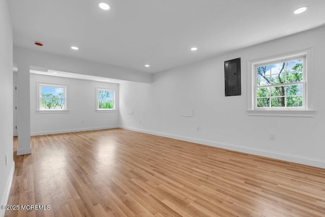 27 Main St, Port Monmouth, NJ 07758 - spare room with electric panel, light wood-style flooring, baseboards, and recessed lighting
