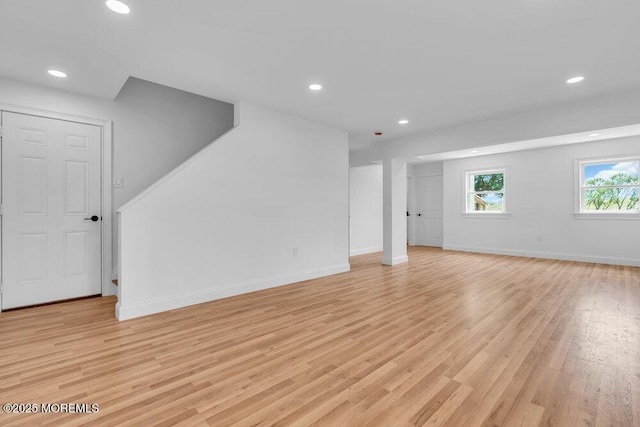 27 Main St, Port Monmouth, NJ 07758 - unfurnished living room featuring light wood-type flooring, recessed lighting, and baseboards
