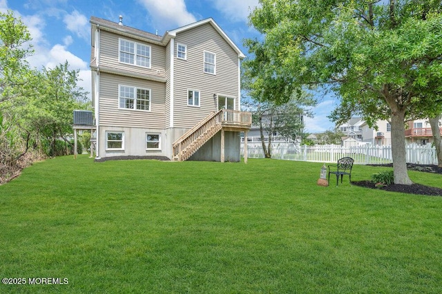 27 Main St, Port Monmouth, NJ 07758 - rear view of house with stairs and a wooden deck