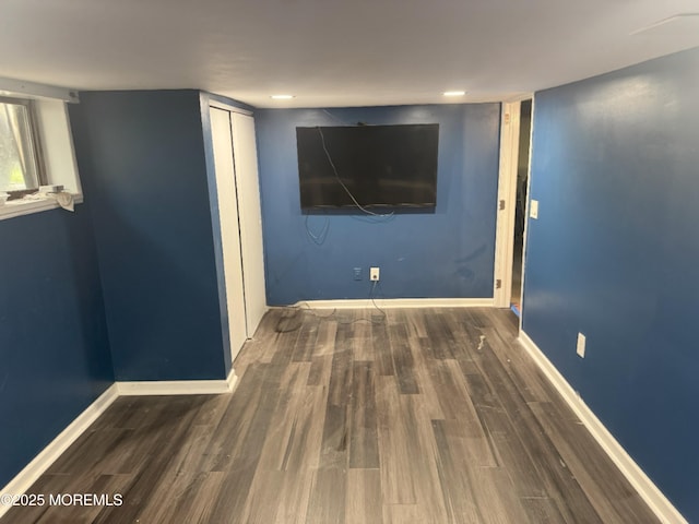 279 Washington St, Keyport, NJ 07735 - below grade area with wood finished floors and baseboards