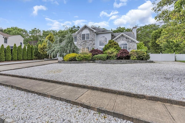 1771 Calico Ln, Toms River, NJ 08753 - view of front of house with stone siding and a chimney