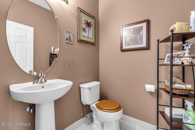 1771 Calico Ln, Toms River, NJ 08753 - bathroom featuring toilet, baseboards, and tile patterned floors