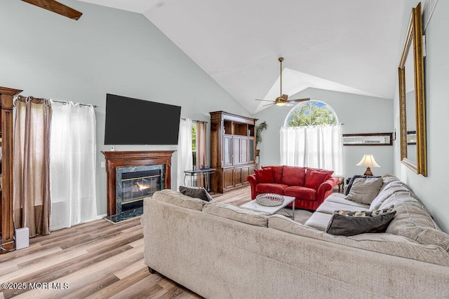 1771 Calico Ln, Toms River, NJ 08753 - living area with a ceiling fan, high vaulted ceiling, light wood-type flooring, and a premium fireplace