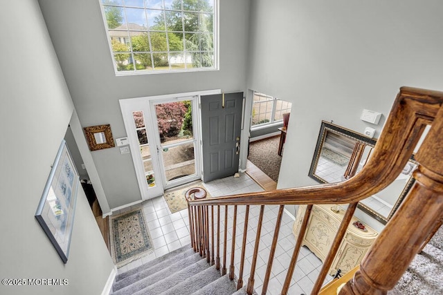 1771 Calico Ln, Toms River, NJ 08753 - tiled foyer with a high ceiling, stairs, and baseboards