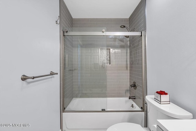 1771 Calico Ln, Toms River, NJ 08753 - bathroom featuring toilet, shower / bath combination with glass door, and vanity