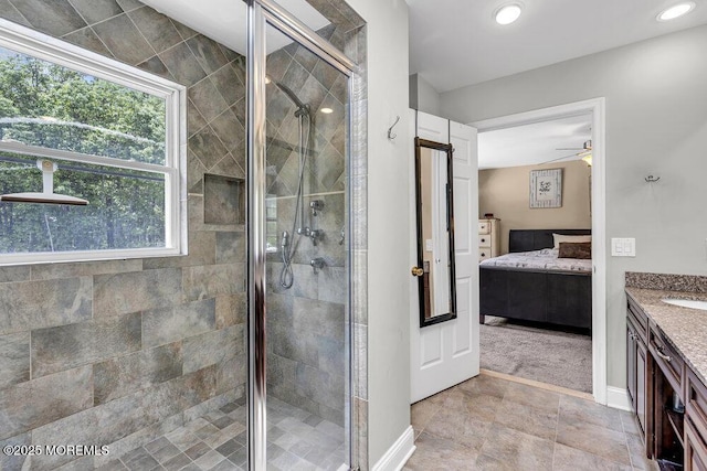 1771 Calico Ln, Toms River, NJ 08753 - ensuite bathroom with vanity, a shower stall, ceiling fan, and baseboards