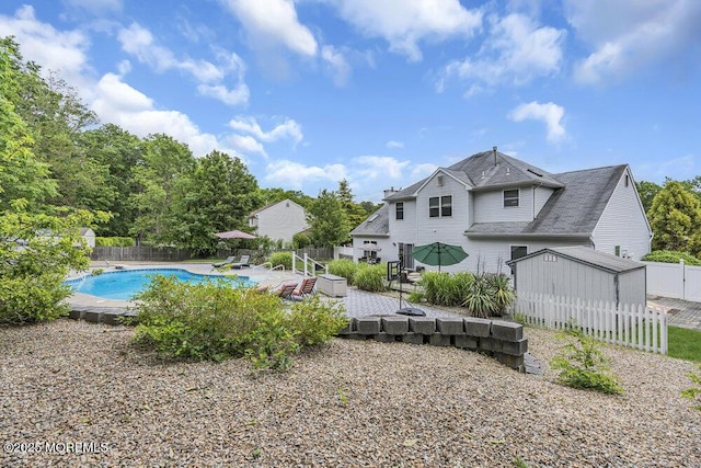 1771 Calico Ln, Toms River, NJ 08753 - back of house featuring a fenced backyard, a patio, and roof with shingles